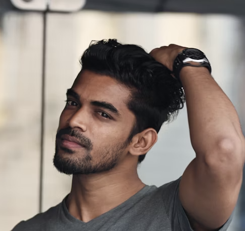 Man touching his dark hair